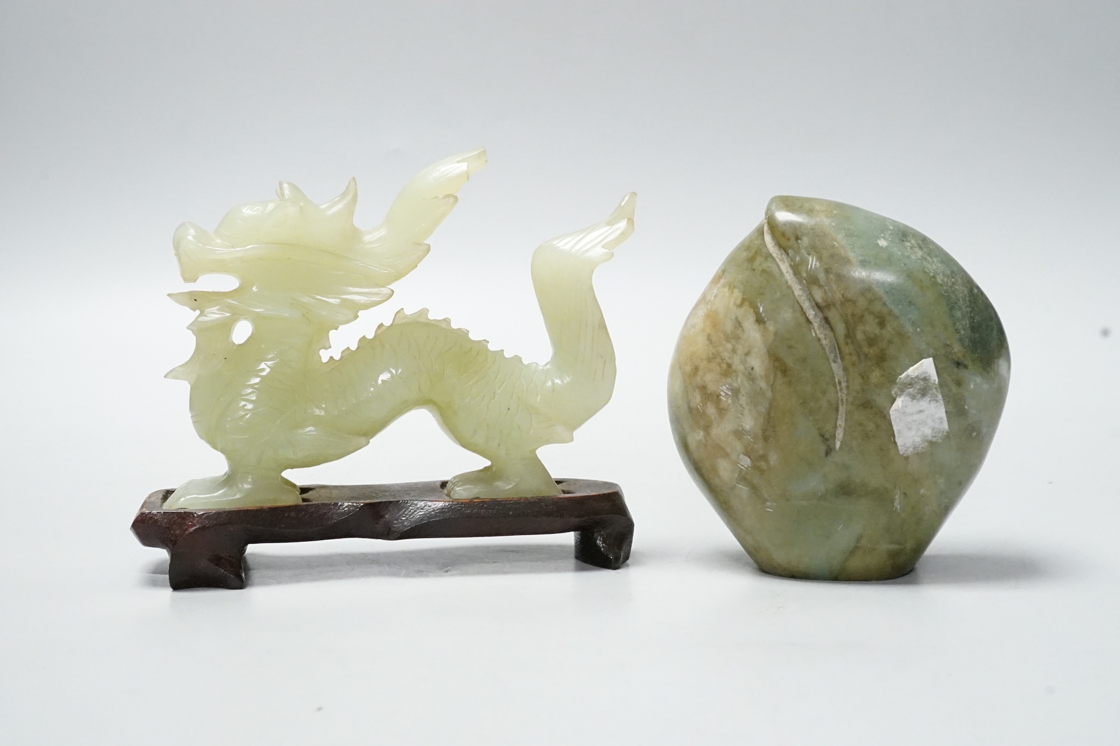 A Chinese bowenite dragon on stand and a soapstone carving, largest 12cm long